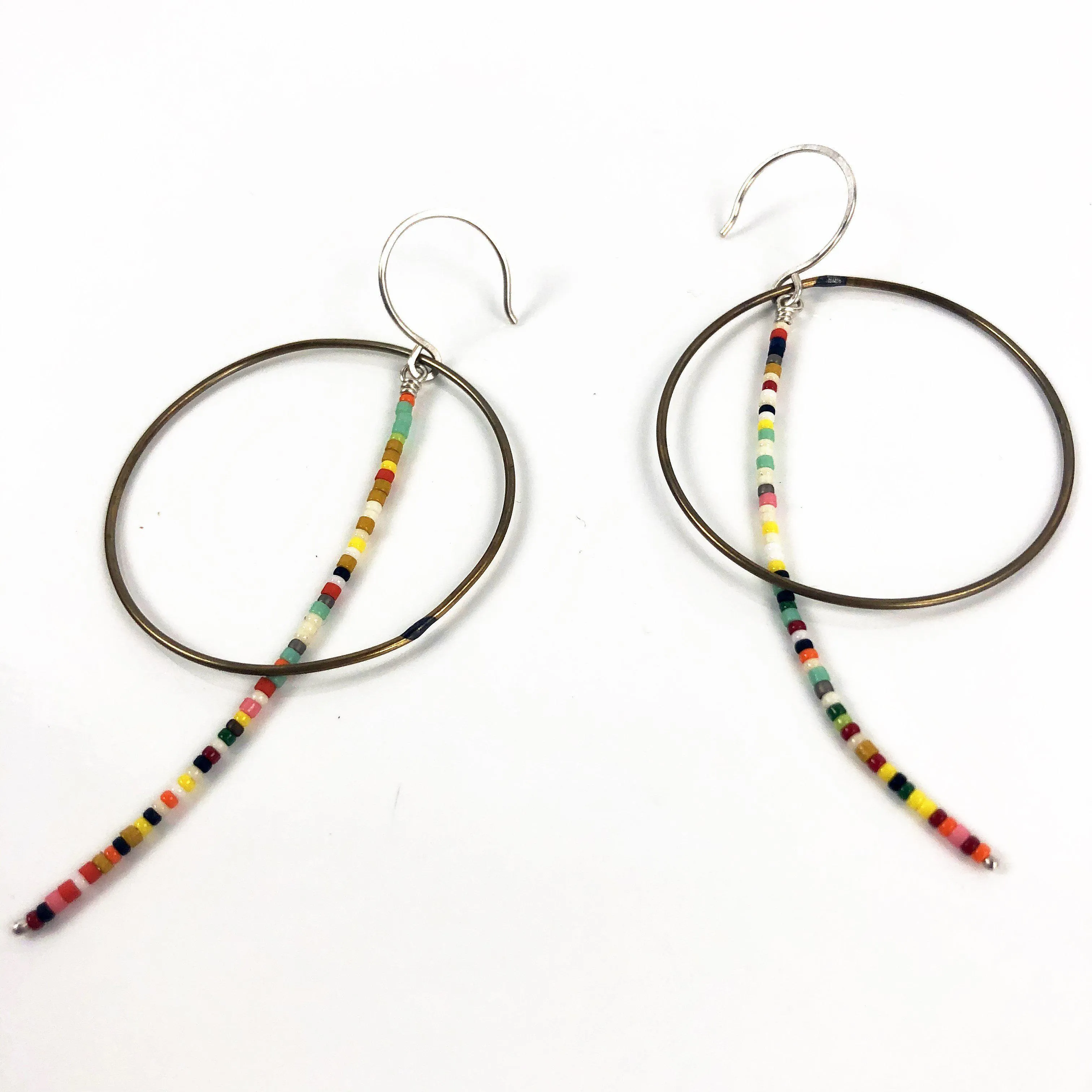 Olivia de Soria Earrings: Brass Circular Beaded Line