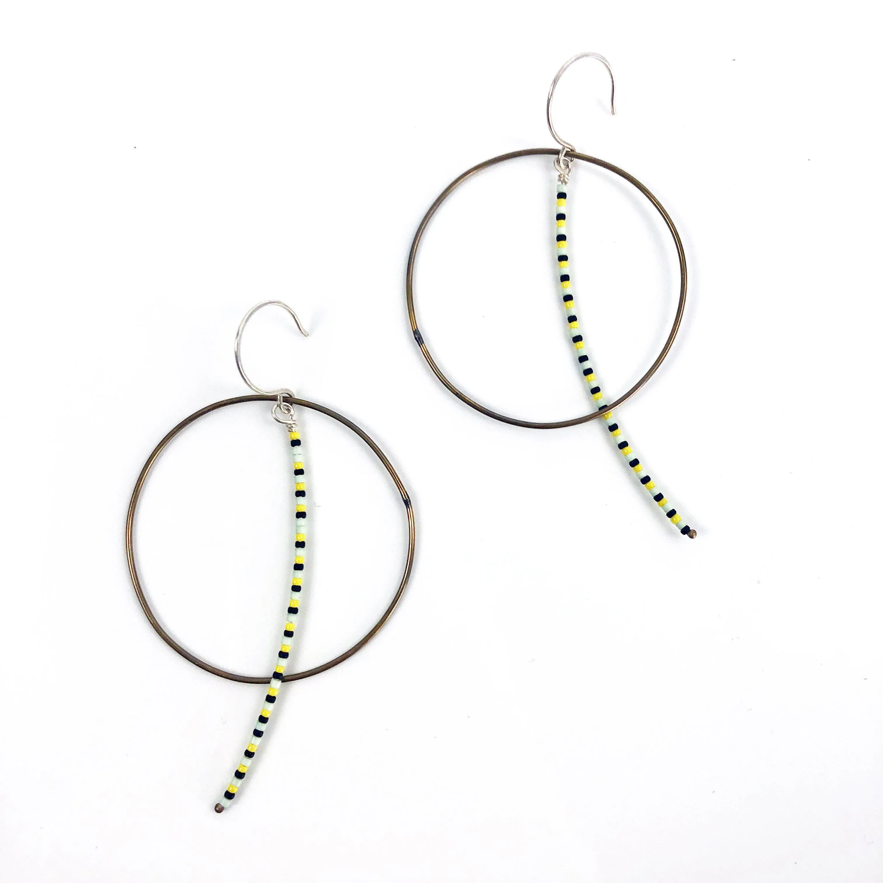 Olivia de Soria Earrings: Brass Circular Beaded Line